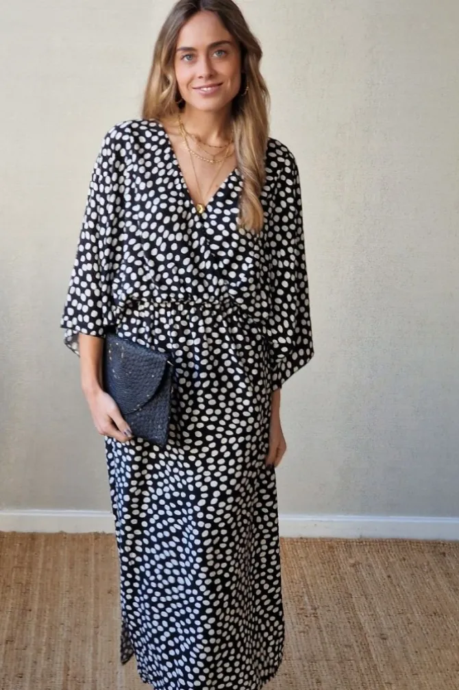 Vestido negro con lunares blancos